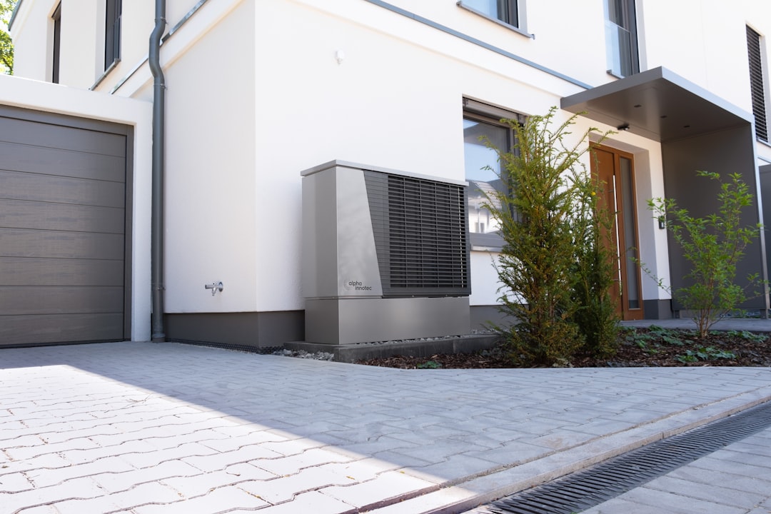 Blog 3 modern residential HVAC unit outside a home - average lifespan of an hvac system