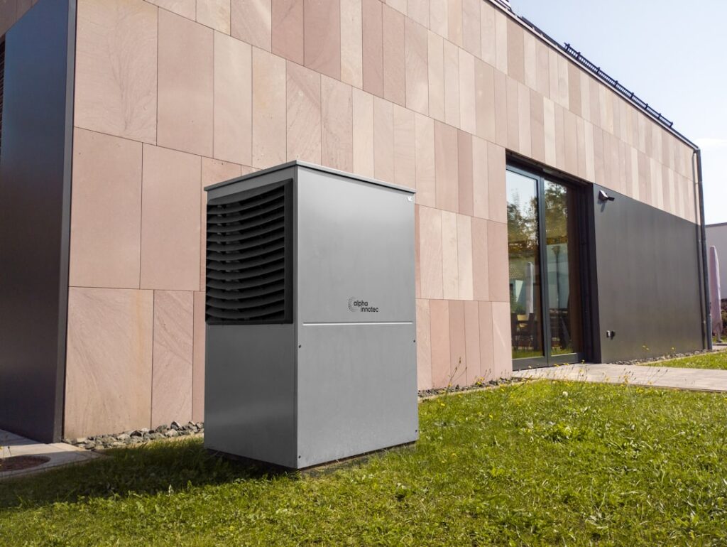 modern high-efficiency air conditioning unit outside a home - what seer2 rating should i look for
