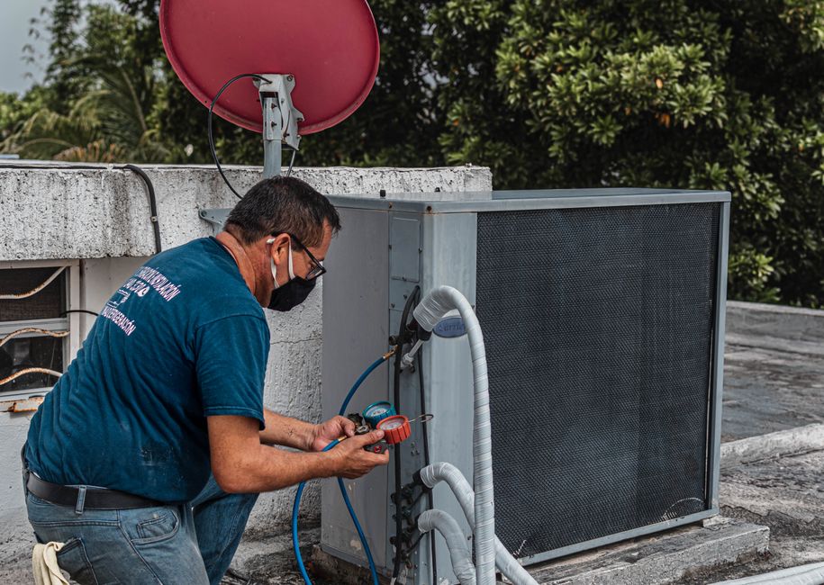 A Comprehensive Guide to HVAC Repair vs Replacement Cost 2 HVAC unit inspection homeowner decision repair or replace